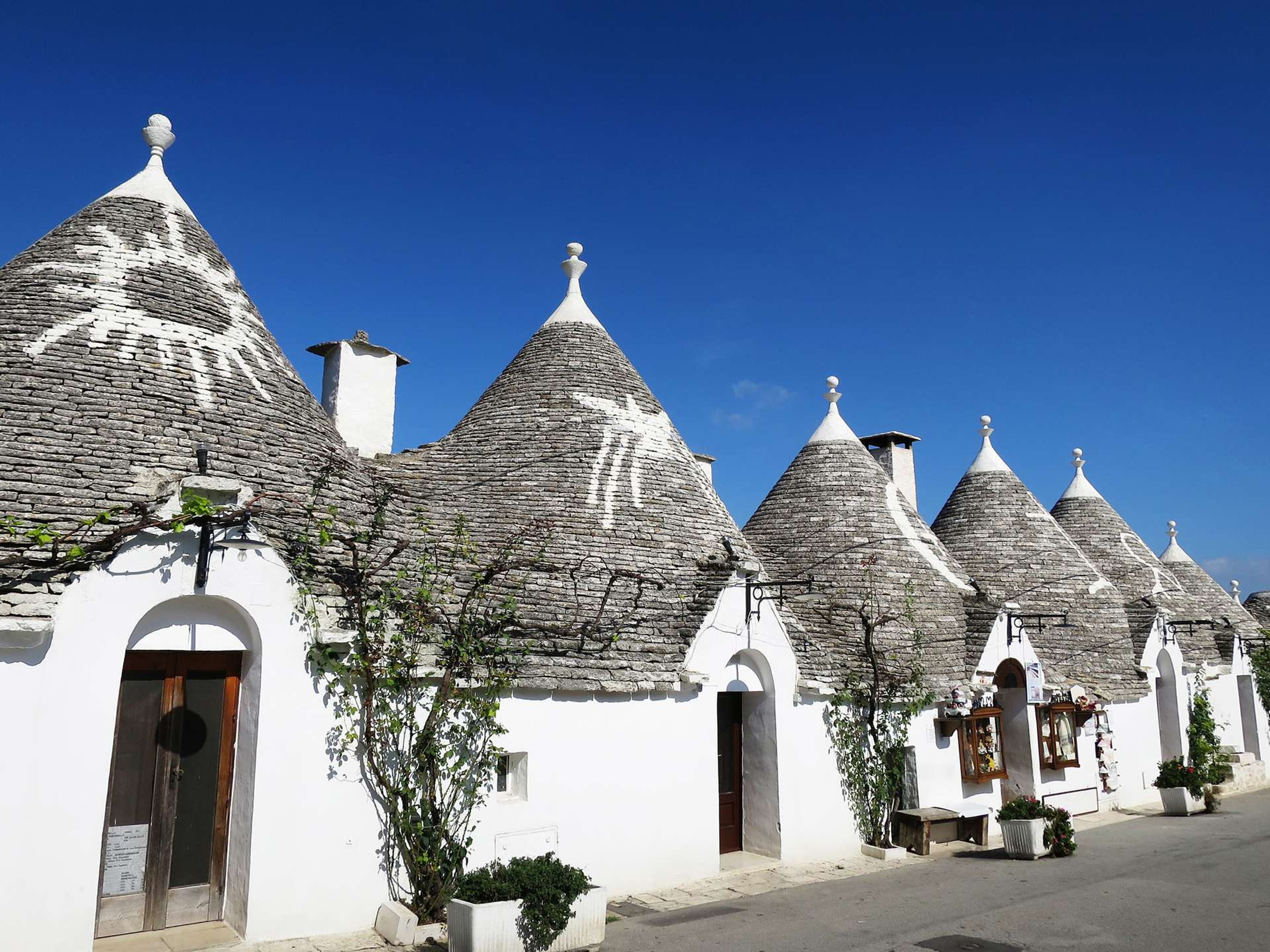 Italië Alberobello trulli houses in Monte Pertica Street