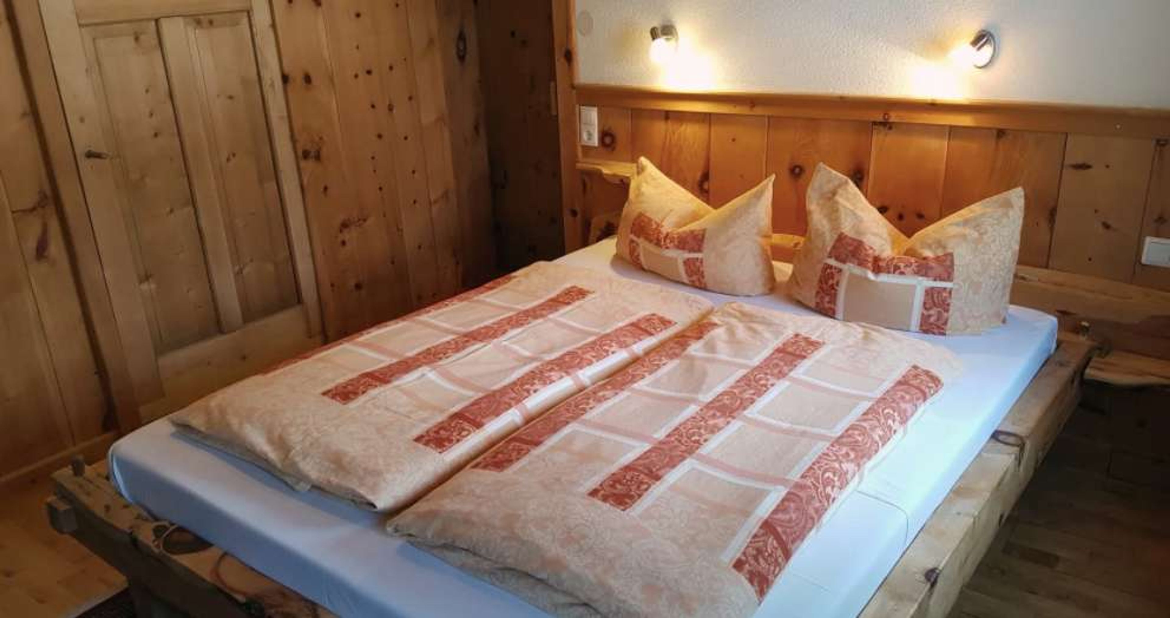 Slaapkamer Pension Wassererhof Tiroler Alpen